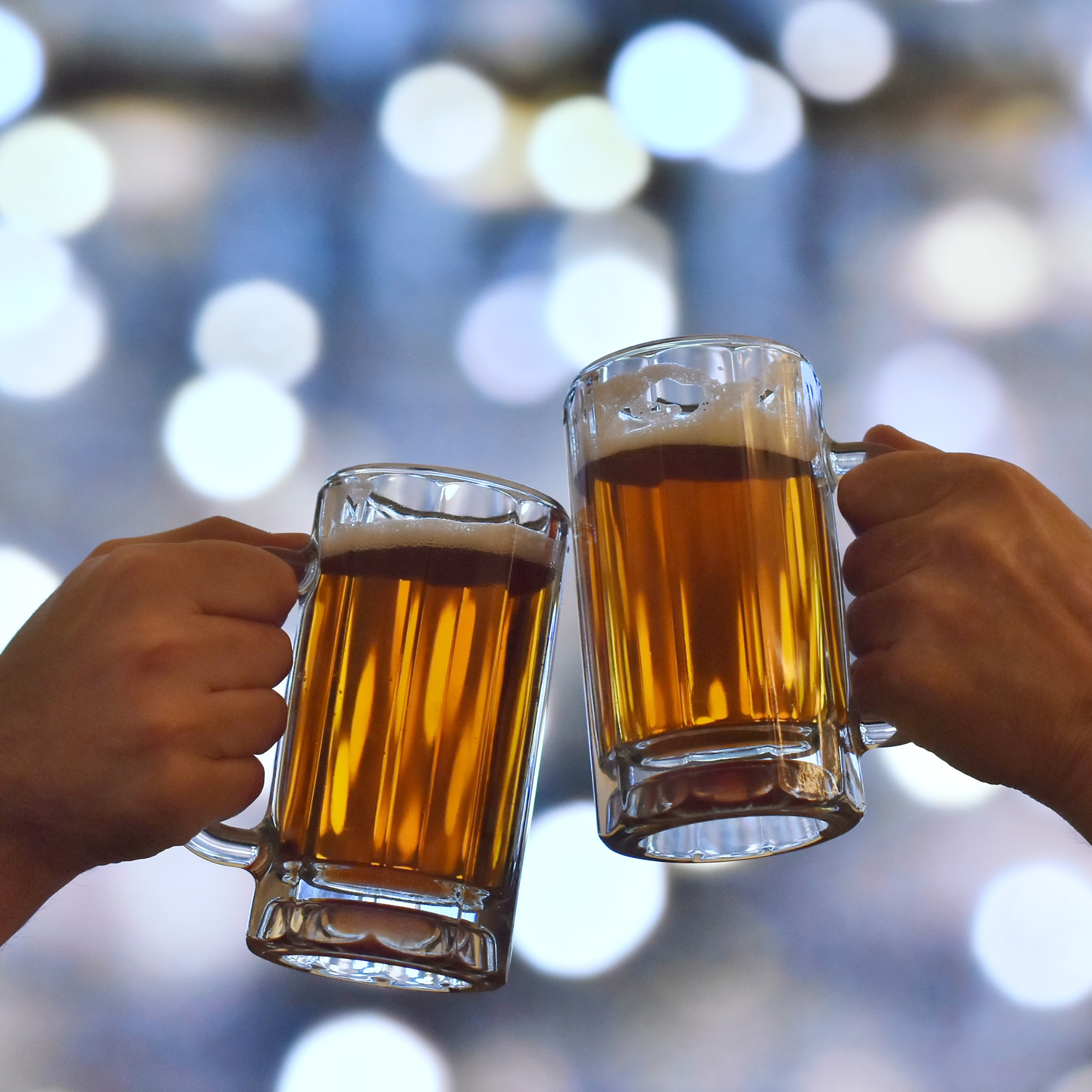 Two glasses of beer, from Log Home Brewing Company’s website